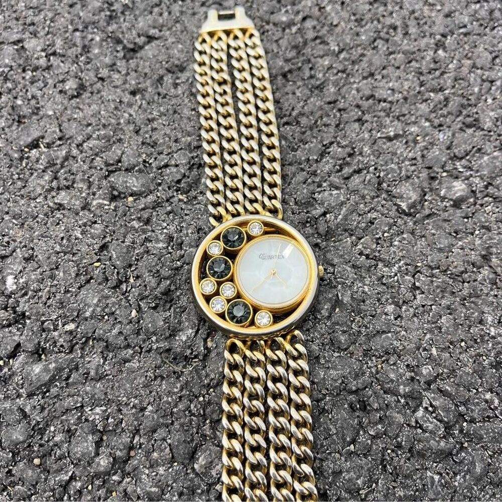 Quartex gold tone watch with gray & white rhinestones - Picture 3 of 6